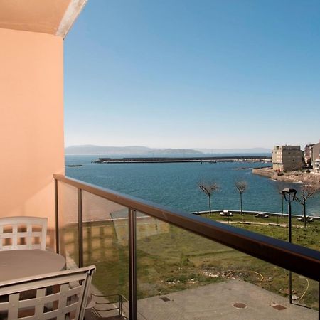 Apartamentos Turisticos Playa De Osmo Corme Bagian luar foto