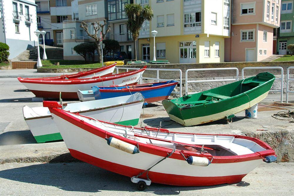 Apartamentos Turisticos Playa De Osmo Corme Bagian luar foto