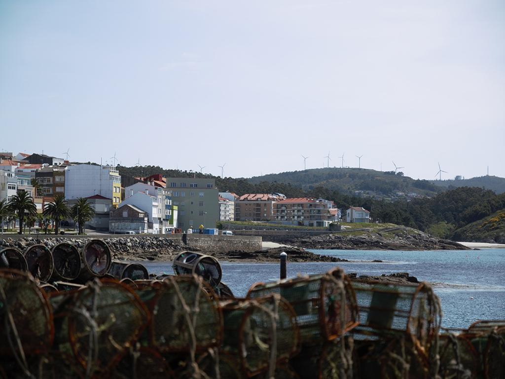 Apartamentos Turisticos Playa De Osmo Corme Bagian luar foto