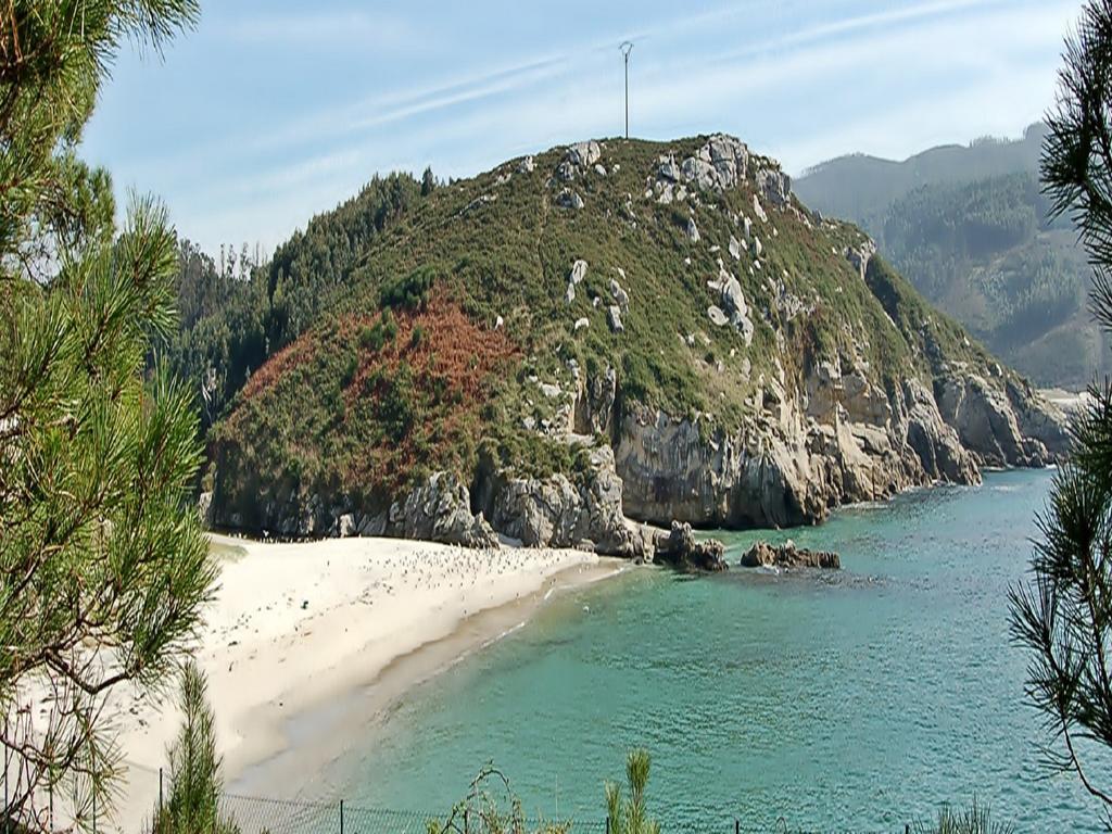 Apartamentos Turisticos Playa De Osmo Corme Bagian luar foto