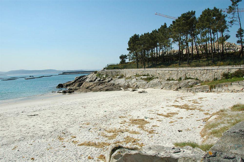 Apartamentos Turisticos Playa De Osmo Corme Bagian luar foto