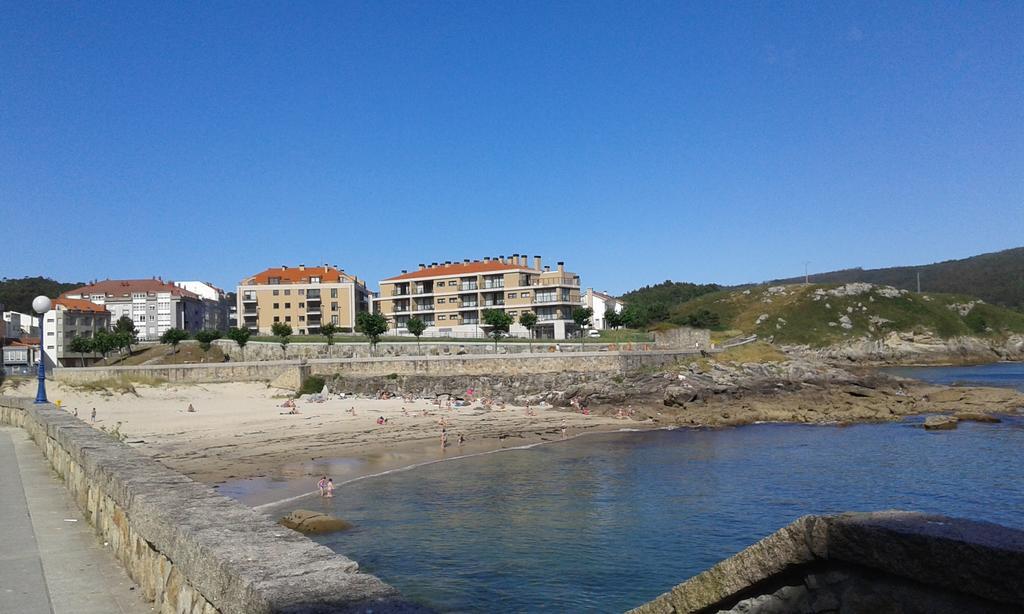 Apartamentos Turisticos Playa De Osmo Corme Bagian luar foto