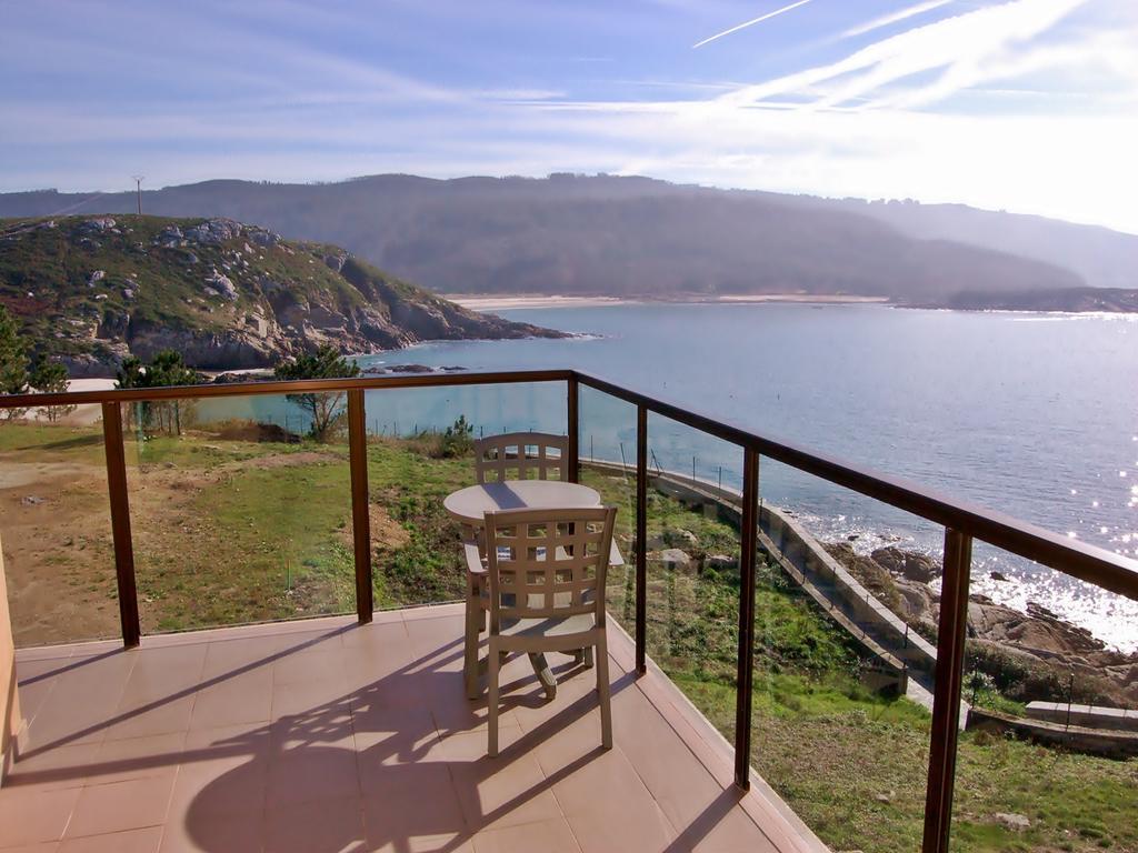 Apartamentos Turisticos Playa De Osmo Corme Bagian luar foto