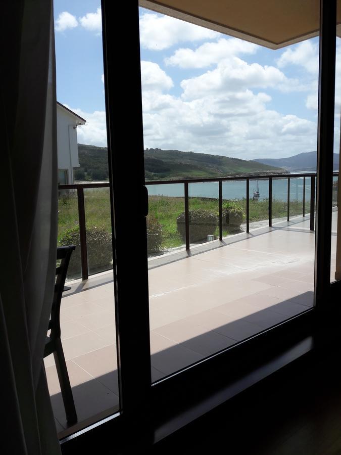 Apartamentos Turisticos Playa De Osmo Corme Bagian luar foto