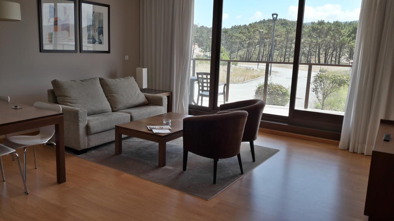 Apartamentos Turisticos Playa De Osmo Corme Bagian luar foto