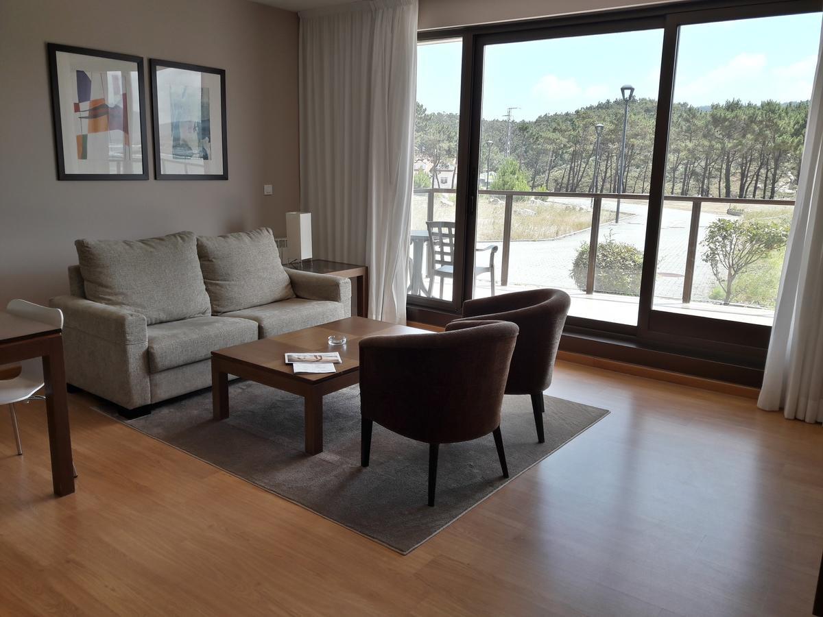 Apartamentos Turisticos Playa De Osmo Corme Bagian luar foto