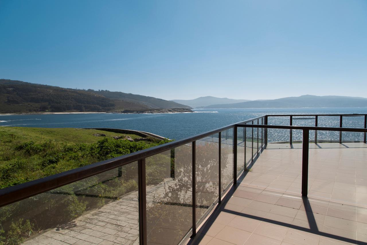 Apartamentos Turisticos Playa De Osmo Corme Bagian luar foto