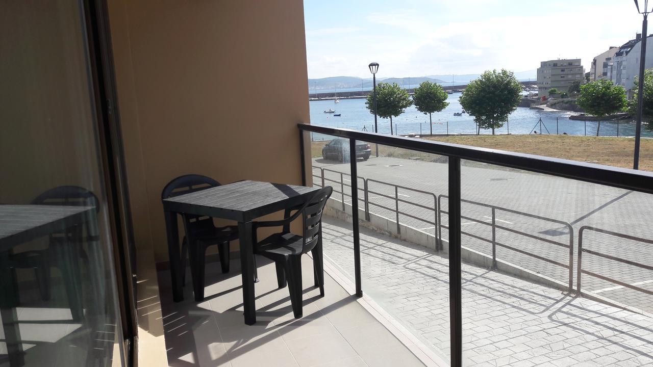 Apartamentos Turisticos Playa De Osmo Corme Bagian luar foto